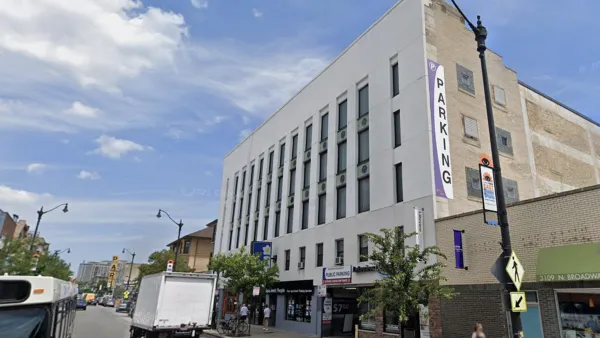 Google street view of white parking garage building in Chicago in 2018 prior to conversion to apartments