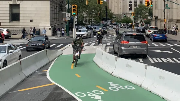 Green painted and protected bike lane on Centre Street