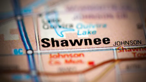 A map focuses on the city of Shawnee, Kansas and its surrounding roads and neighboring towns.