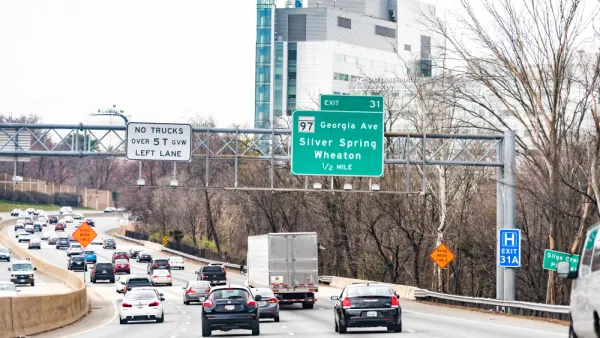 A freeway in Maryland near Washington, D.C., on the Capital Beltway with an exit sign for Wheaton.