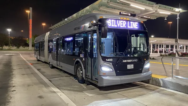 Silver Houston Silver Line bus at a dedicated bus rapid transit station