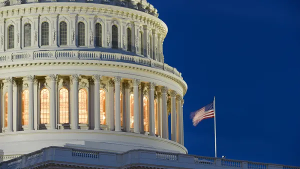 A close up image of the exterior of the U.S. Capitol Rotunda illuminated at dusk.