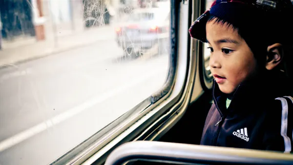 Kid on Bus