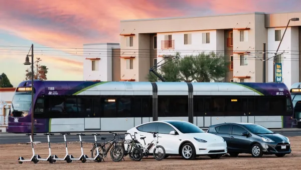 Rendering of electric scooters, electric cars, light rail train, and apartments in background.