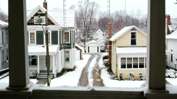 Wooden houses covered with snow