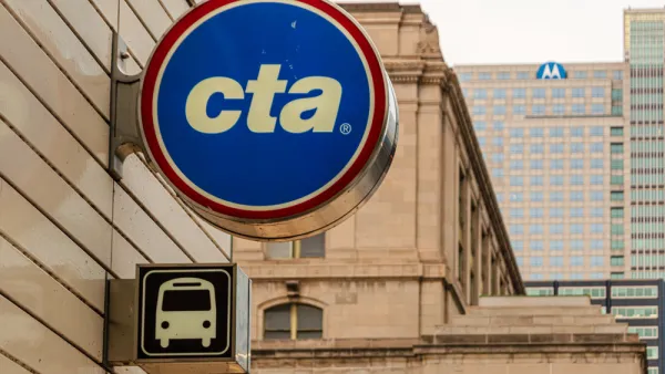 Round sign on building with white CTA logo on blue background