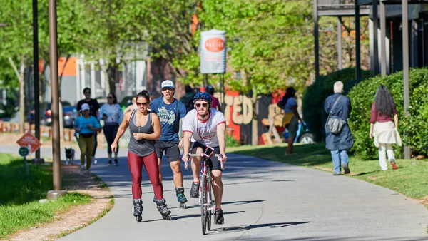 People biking and rollerblading on Atlanta BeltLine trail