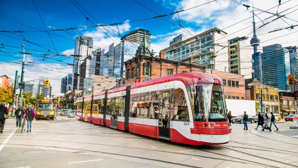 Red and white Toronto streetcar