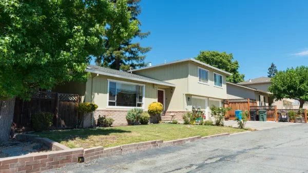 Yellow house on residential street in Atherton, California