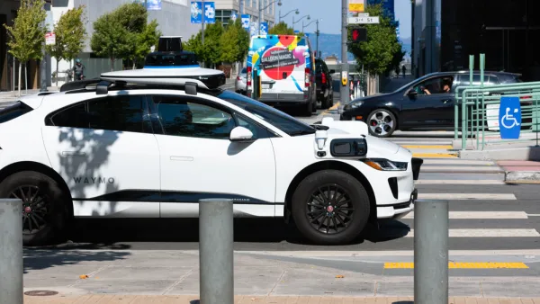 White Waymo self-driving car on San Francisco street