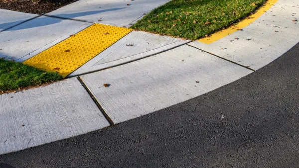 Curb cut at corer of sidewalk