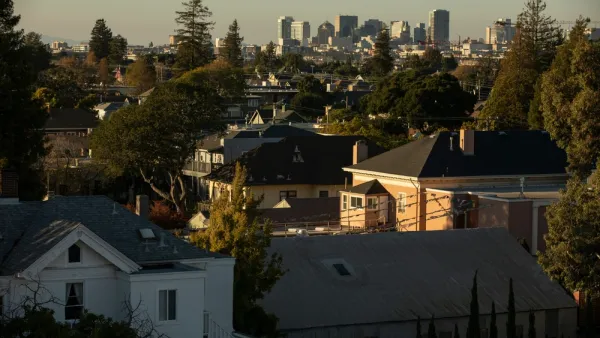 View of homes and Alameda, California skyline in background