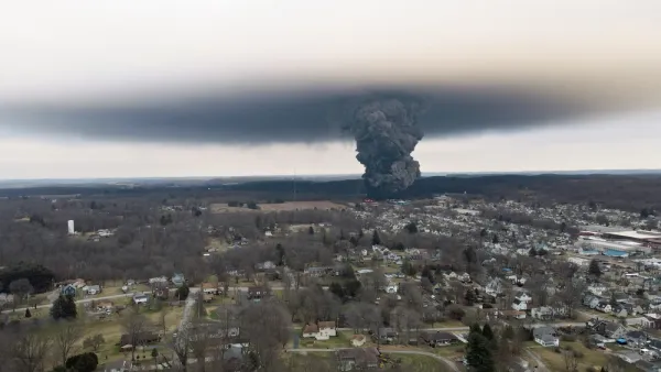 Gray chemical cloud seen from a distance from train derailment in Palestine, Ohio