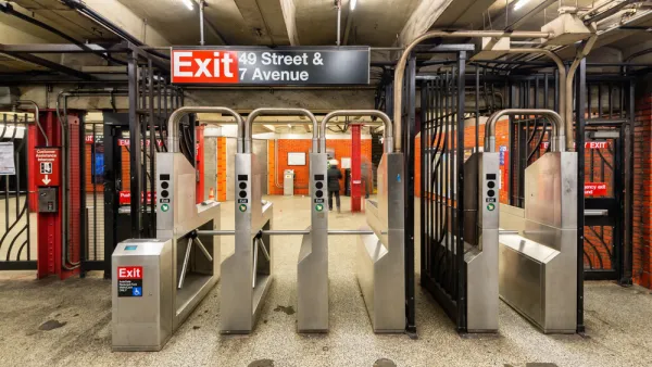 Empty fare turnstiles at New York City subway station