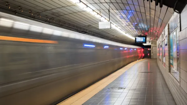 Jersey City, NJ - November 13, 2016: Train passing through the Exchange Place PATH station located at Exchange Place in Jersey City, New Jersey, adjacent to the Hudson River at Paulus Hook.