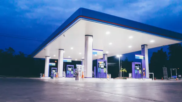 Nighttime view of empty gas station