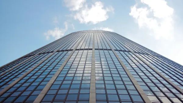 View of sky reflected in windows of Tour Montparnasse in Paris